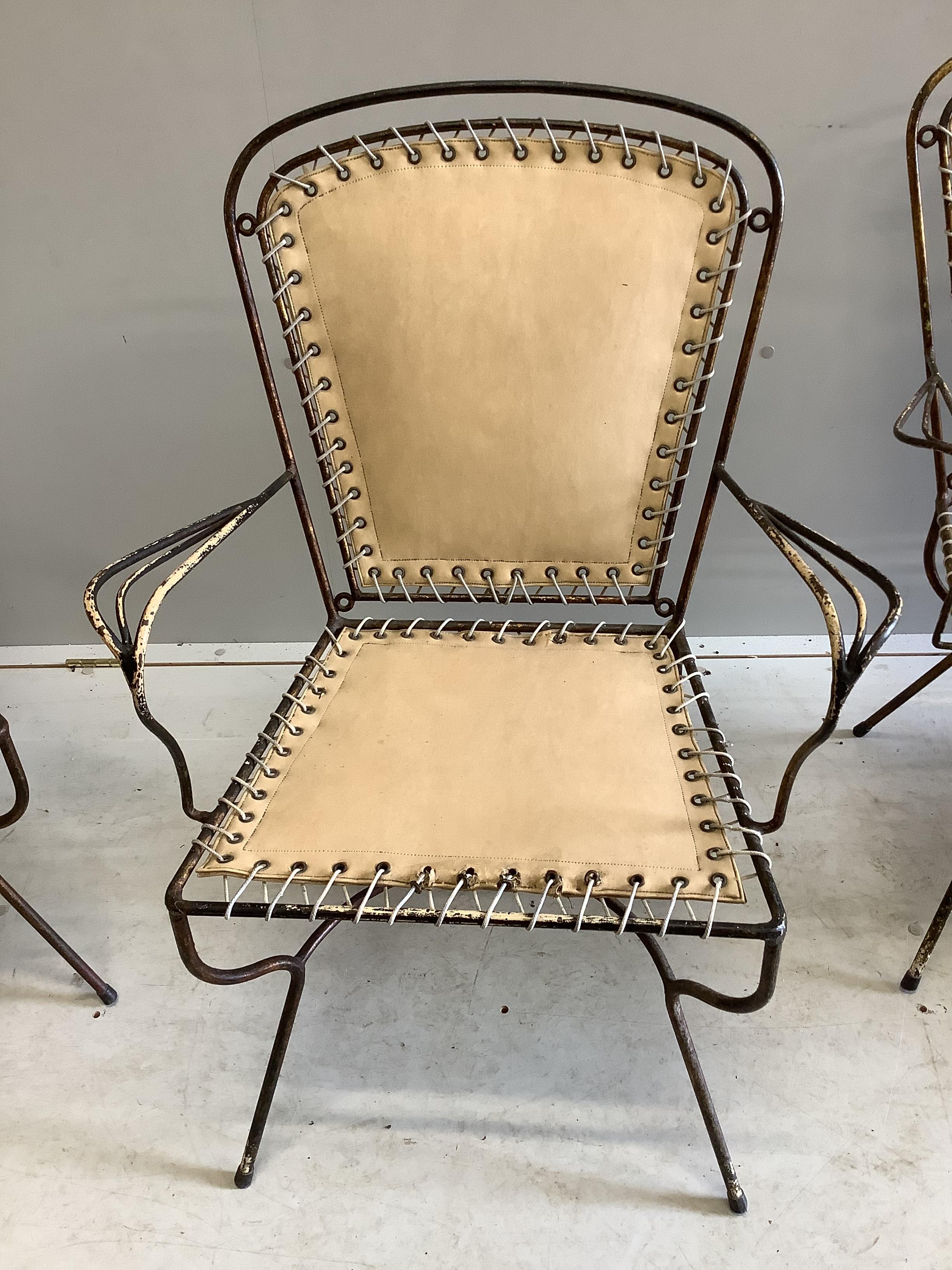 A set of four mid century wrought iron chairs, width 60cm, depth 50cm, height 84cm